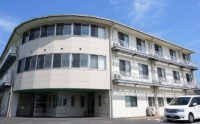岡山市南区平福にあるサービス付き高齢者向け住宅「ケアホームきずな」の外観写真